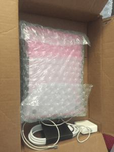 Bubble-wrapped Macbook Pro for shipping