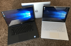 dell xps and microsoft surface book laptops