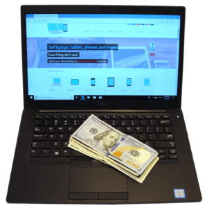 Laptop and Cash